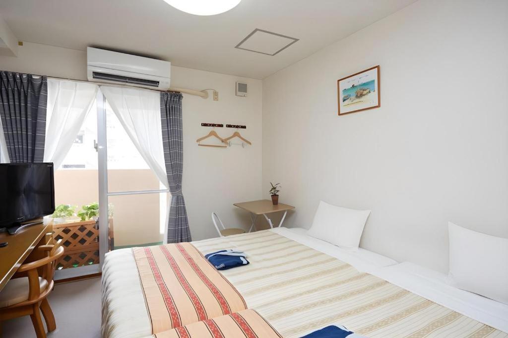 Hotel Peace Land Kume Наха Екстериор снимка