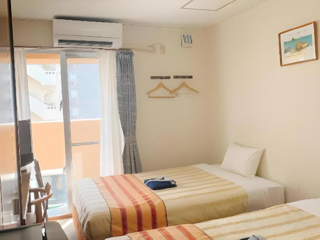 Hotel Peace Land Kume Наха Екстериор снимка