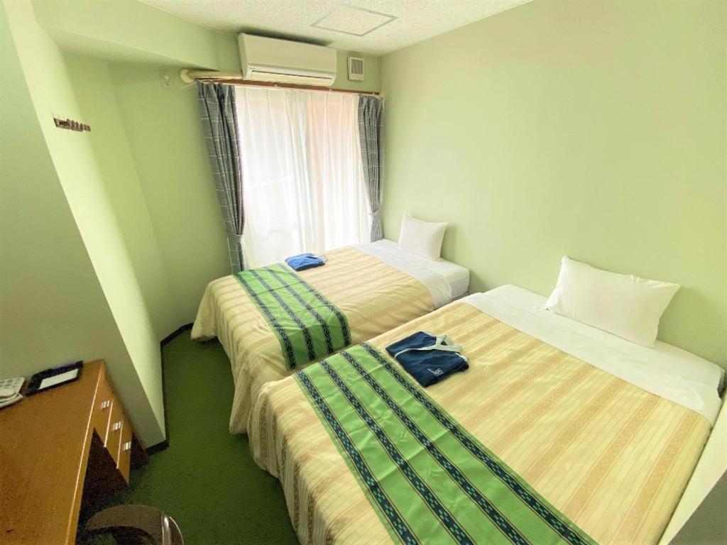 Hotel Peace Land Kume Наха Екстериор снимка